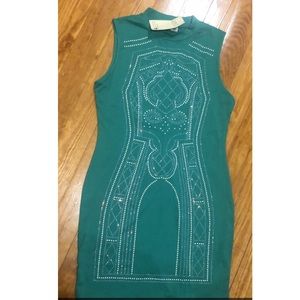 Green dress with sequences.